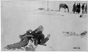 femme agonisante à Wounded Knee